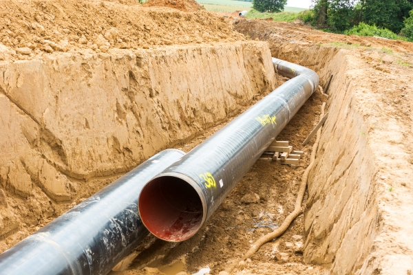Large diameter water main installed in trench